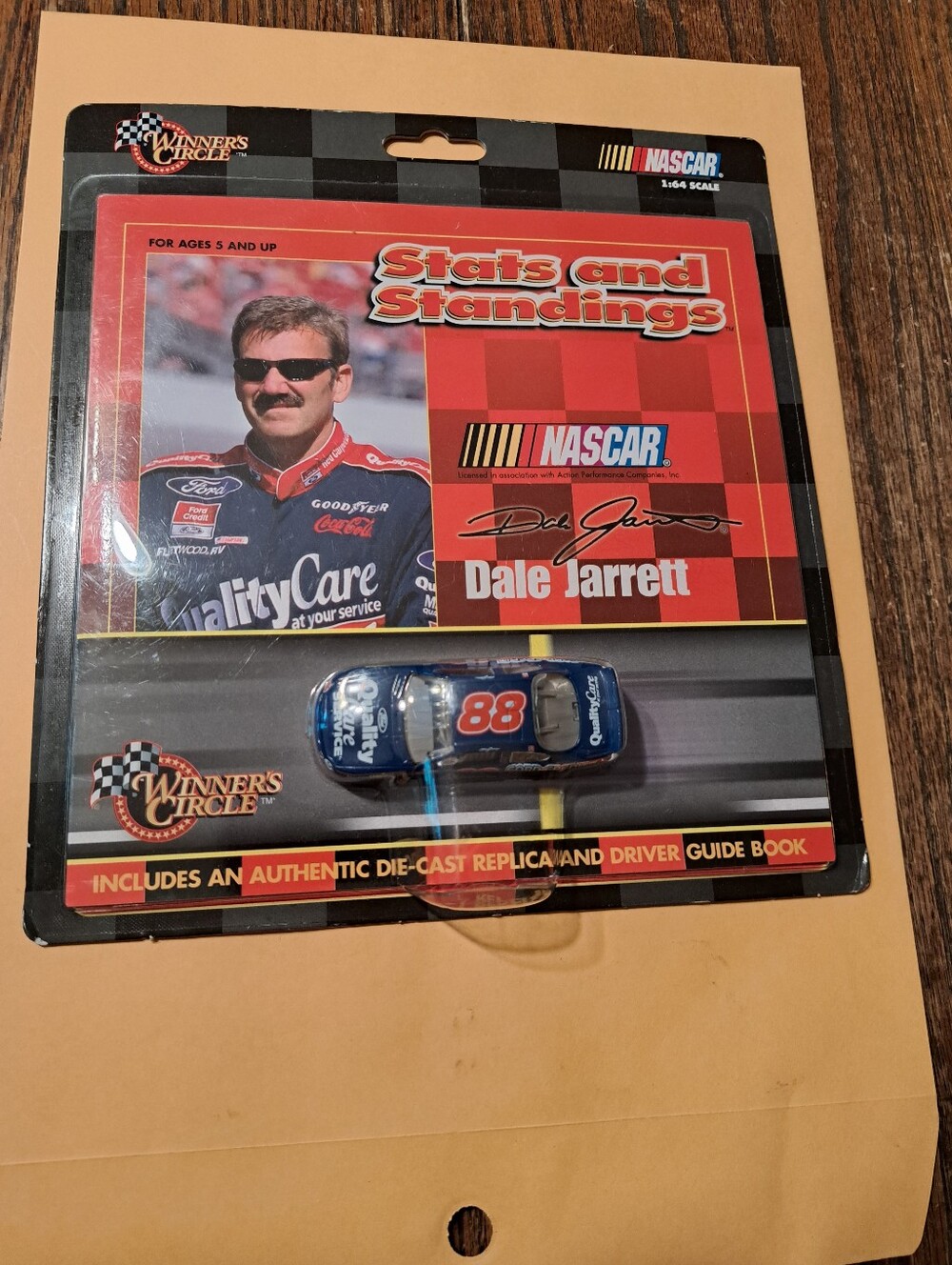 Dale Jarrett #88 Ford Quality Care 1:64 NASCAR Diecast with Driver Stats Book